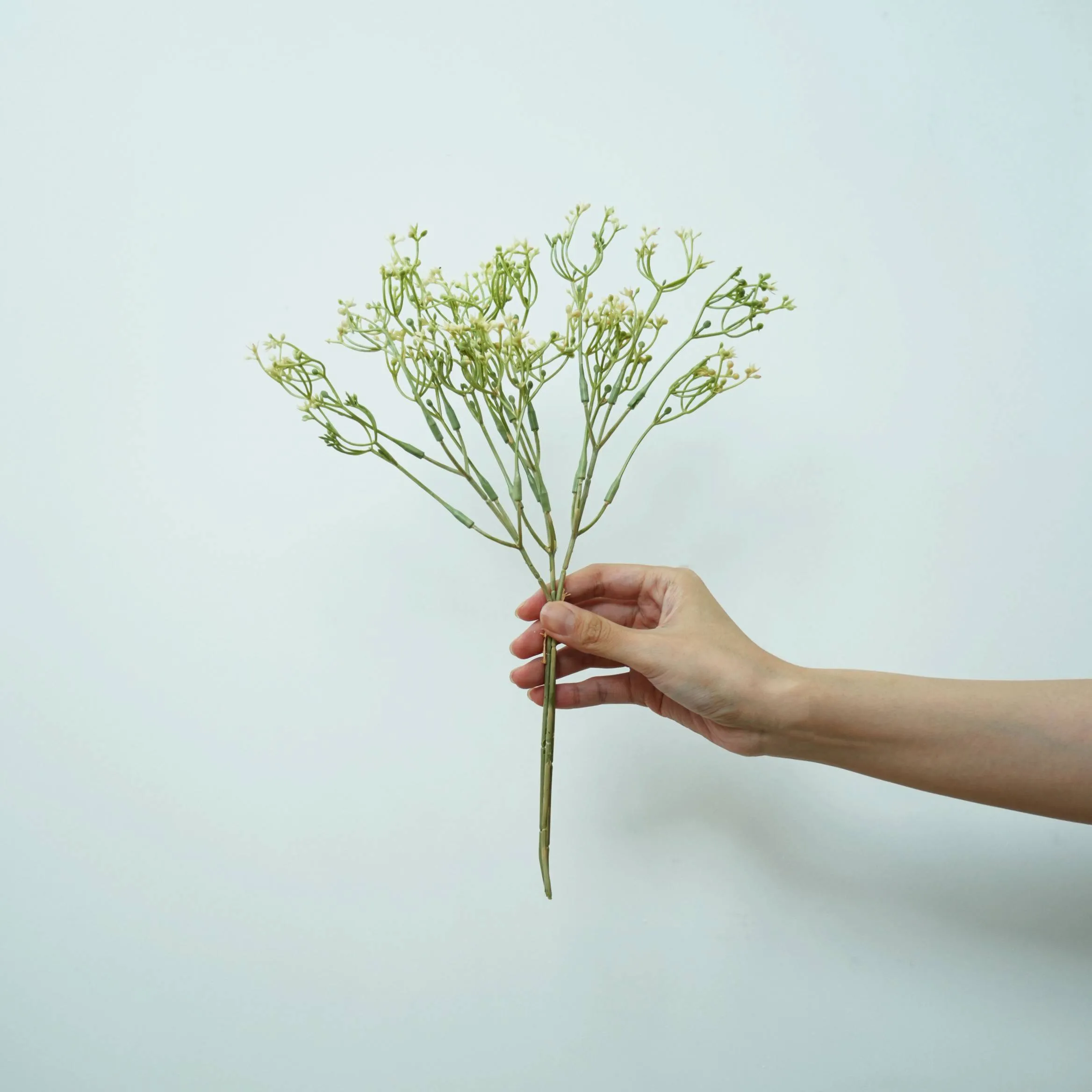 The application of artificial flower arrangements for church altar